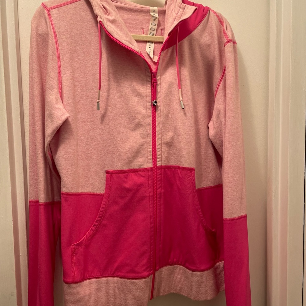 Lululemon jacket, size 12, two tone pink. excellent condition.
